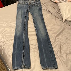 Medium wash jean, size 25 long